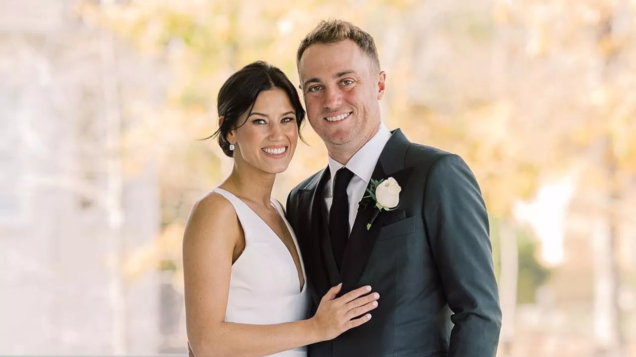 Justin Thomas and his wife, Jillian Wisniewski, during their wedding.