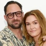 Julia Stiles quietly welcomed her third child with husband Preston Cook, revealing the surprise alongside her directorial debut, reflecting on motherhood and filmmaking parallels.